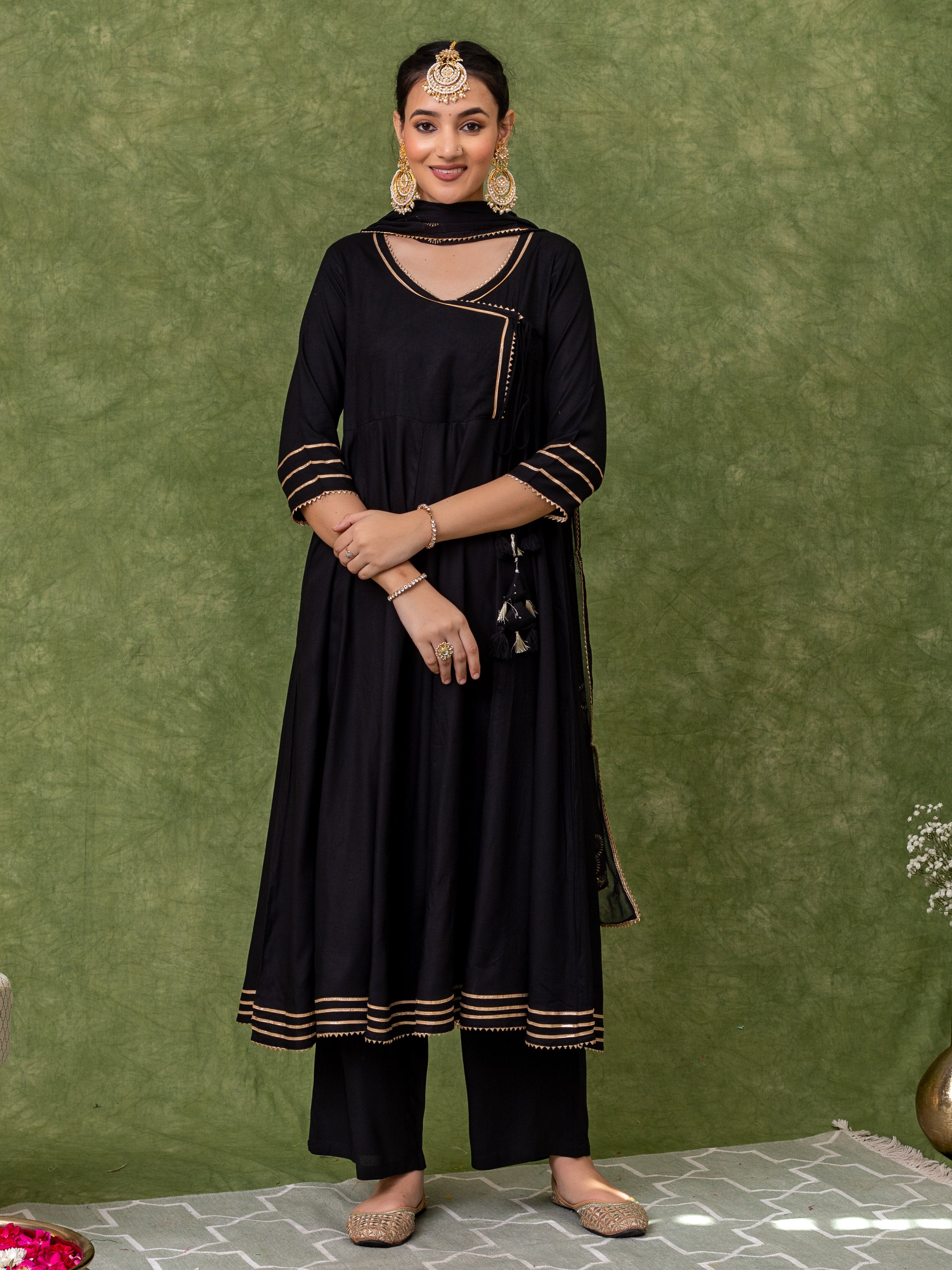 this-black-angrakha-kurta-with-pant-and-dupatta-features-golden-gota-lace-work-with-heavy-tassels-adding-an-elegant-and-sophisticated-touch-to-your-ensemble-fine-details-in-the-craftsmanship-make-this-a-must-have-item-perfect-for-any-special-occasion