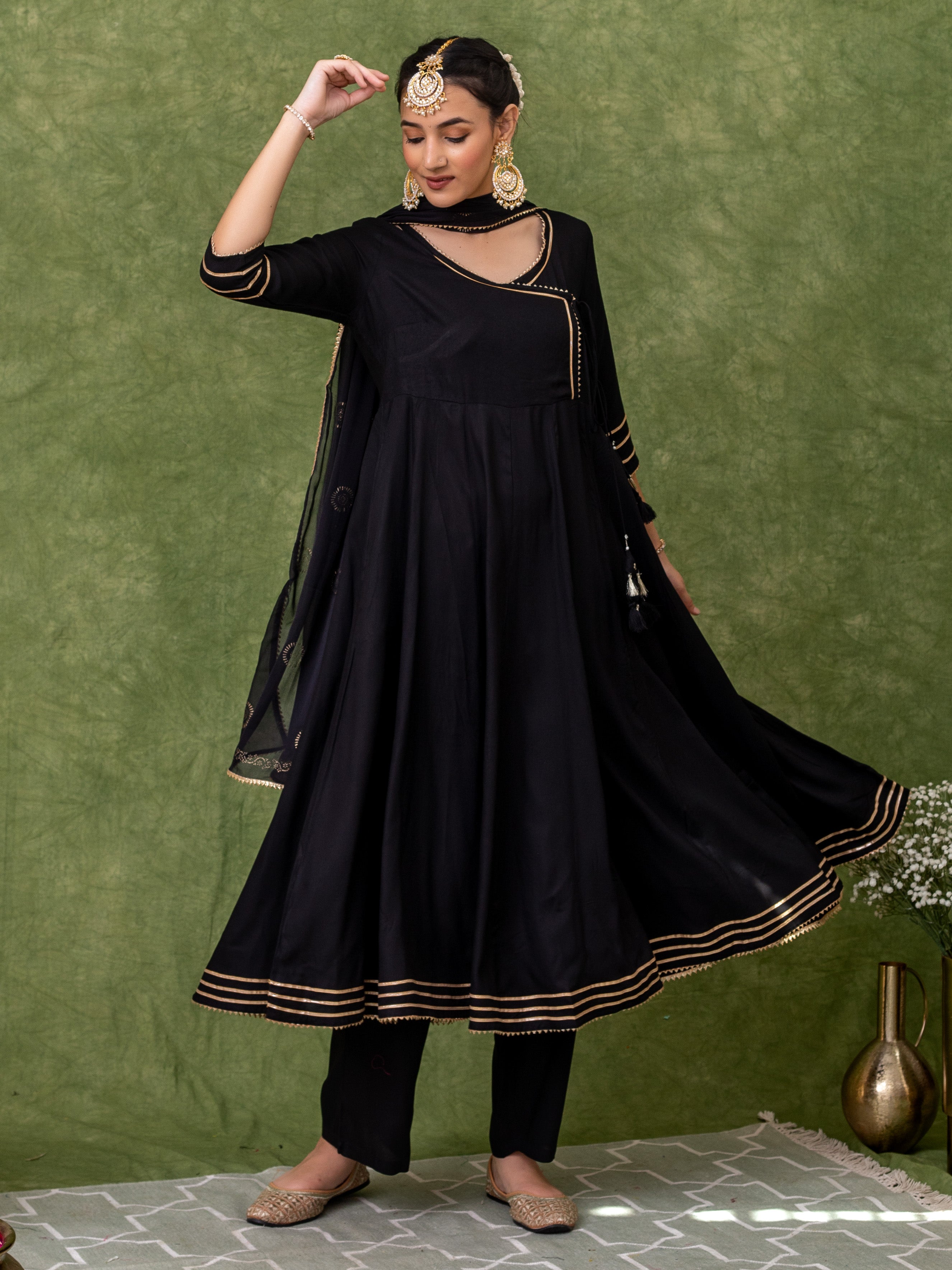 this-black-angrakha-kurta-with-pant-and-dupatta-features-golden-gota-lace-work-with-heavy-tassels-adding-an-elegant-and-sophisticated-touch-to-your-ensemble-fine-details-in-the-craftsmanship-make-this-a-must-have-item-perfect-for-any-special-occasion