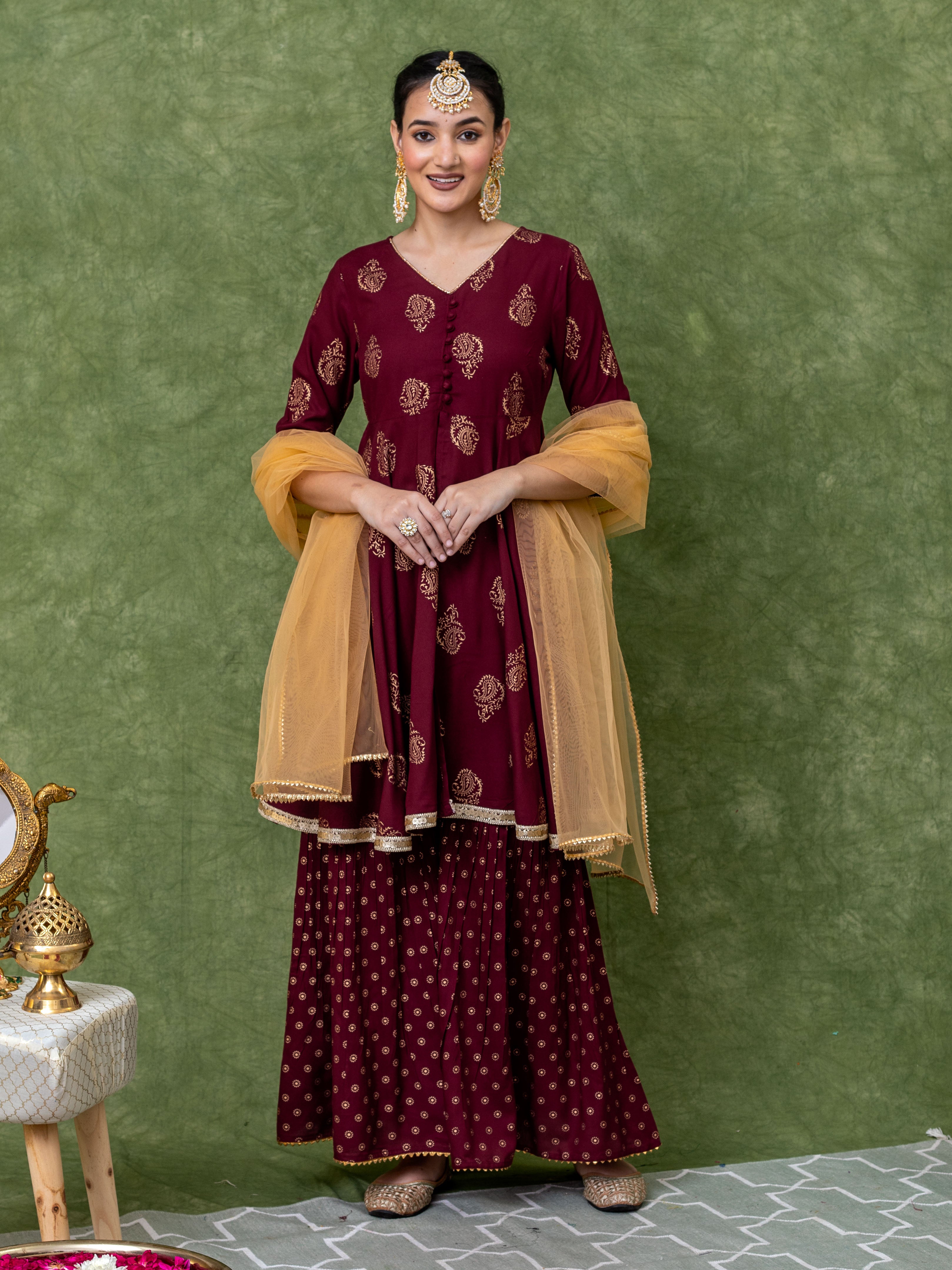 Maroon Gold Printed V Neck Flared Kurti With Mid-Cut and Sharara Paired with Dupatta