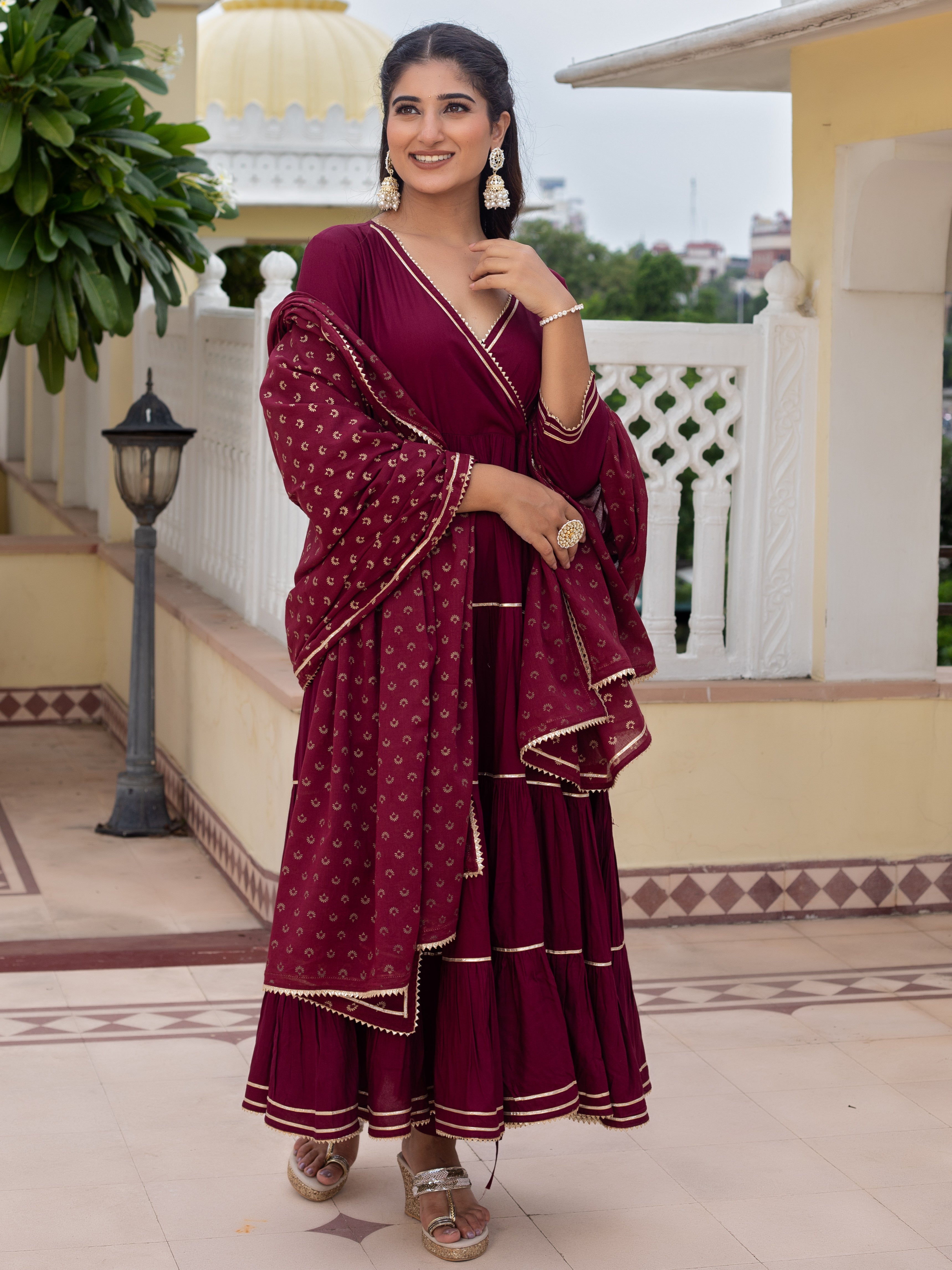 this-burgundy-tiered-kurta-has-been-expertly-crafted-with-a-stylish-tiered-design-featuring-a-kurta-pants-and-a-dupatta-this-three-piece-outfit-will-add-a-touch-of-elegance-to-any-wardrobe