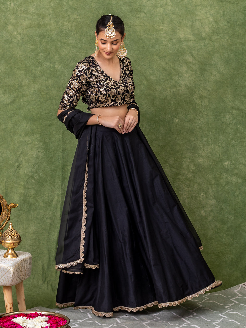 Lehenga set in black with floral Jacquard jaal on the blouse