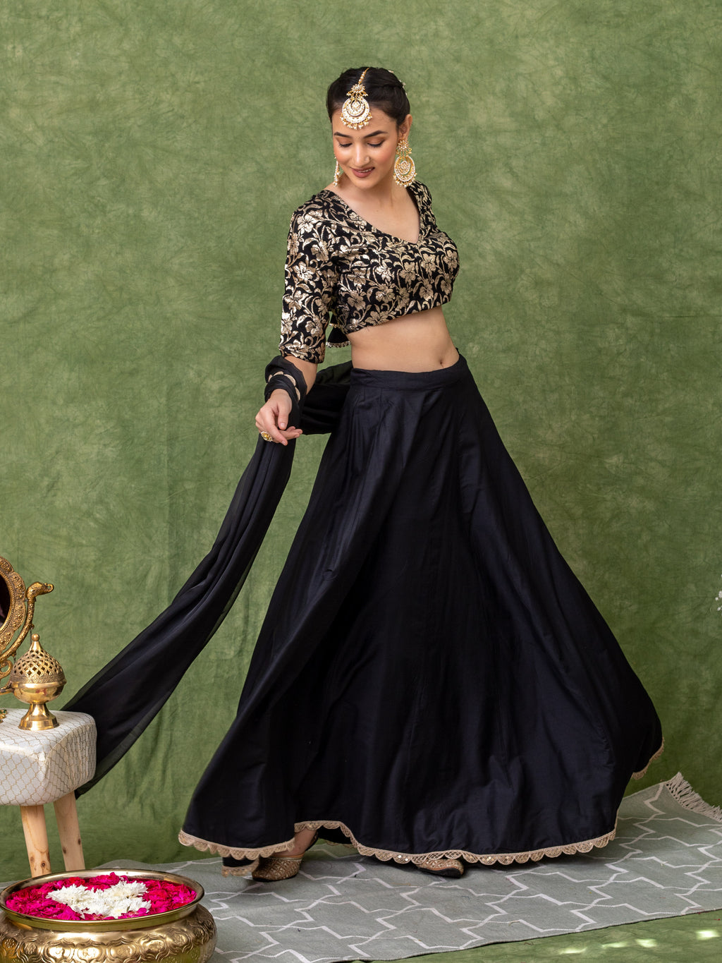 Lehenga set in black with floral Jacquard jaal on the blouse