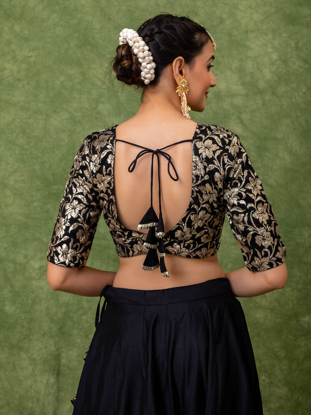 Lehenga set in black with floral Jacquard jaal on the blouse