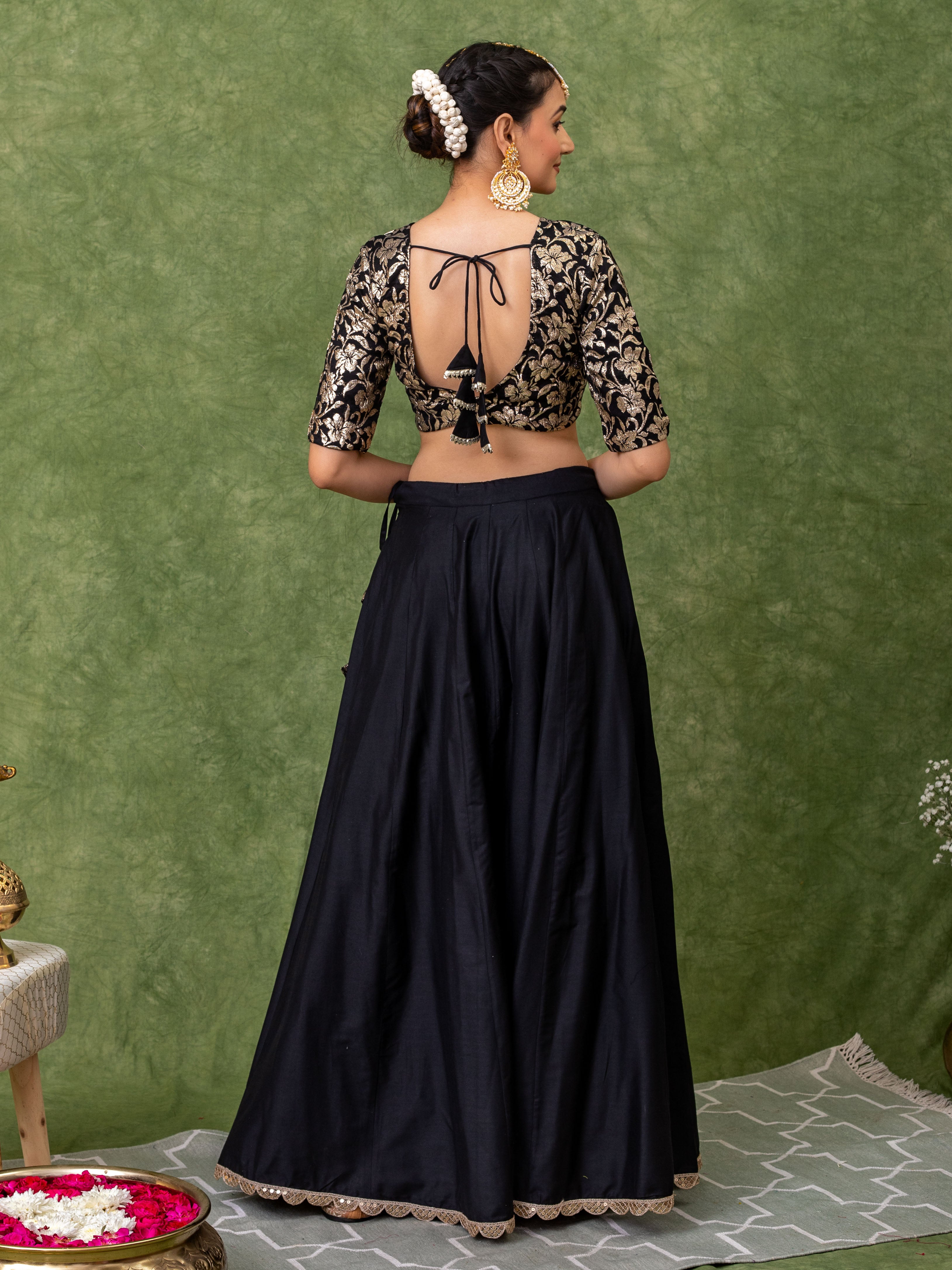 Lehenga set in black with floral Jacquard jaal on the blouse