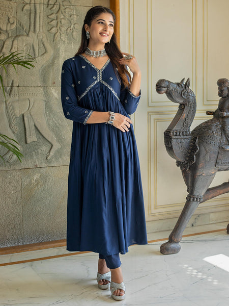 Navy embellished with floral motifs in Kurta set with White lace.