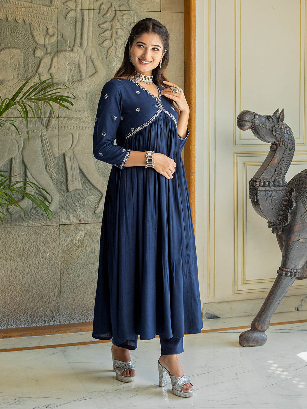 Navy embellished with floral motifs in Kurta set with White lace.