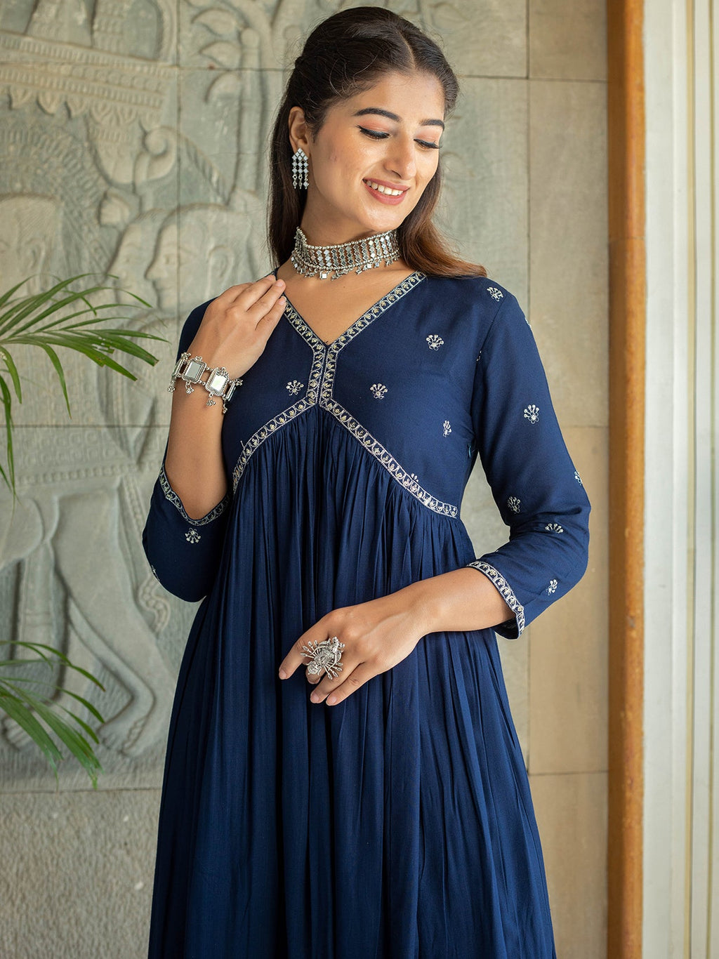 Navy embellished with floral motifs in Kurta set with White lace.