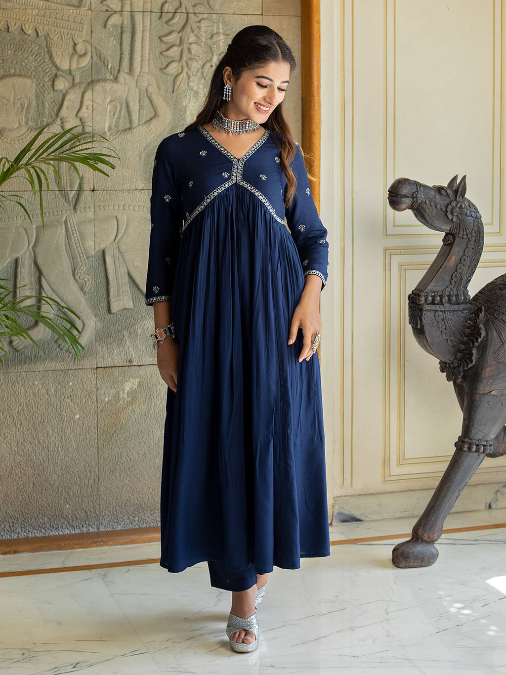 Navy embellished with floral motifs in Kurta set with White lace.