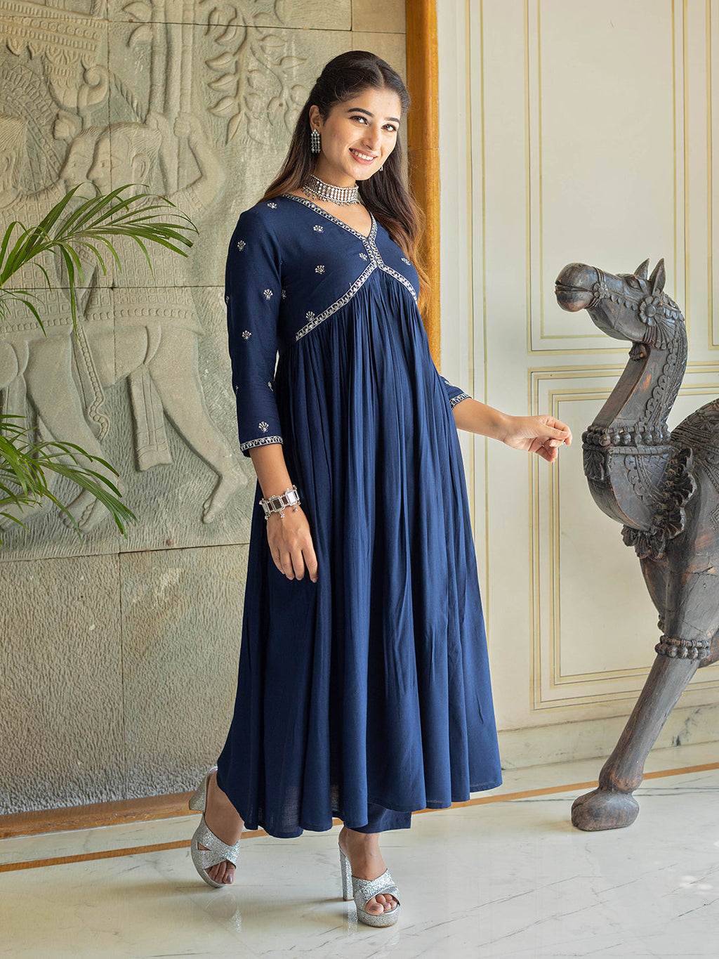 Navy embellished with floral motifs in Kurta set with White lace.