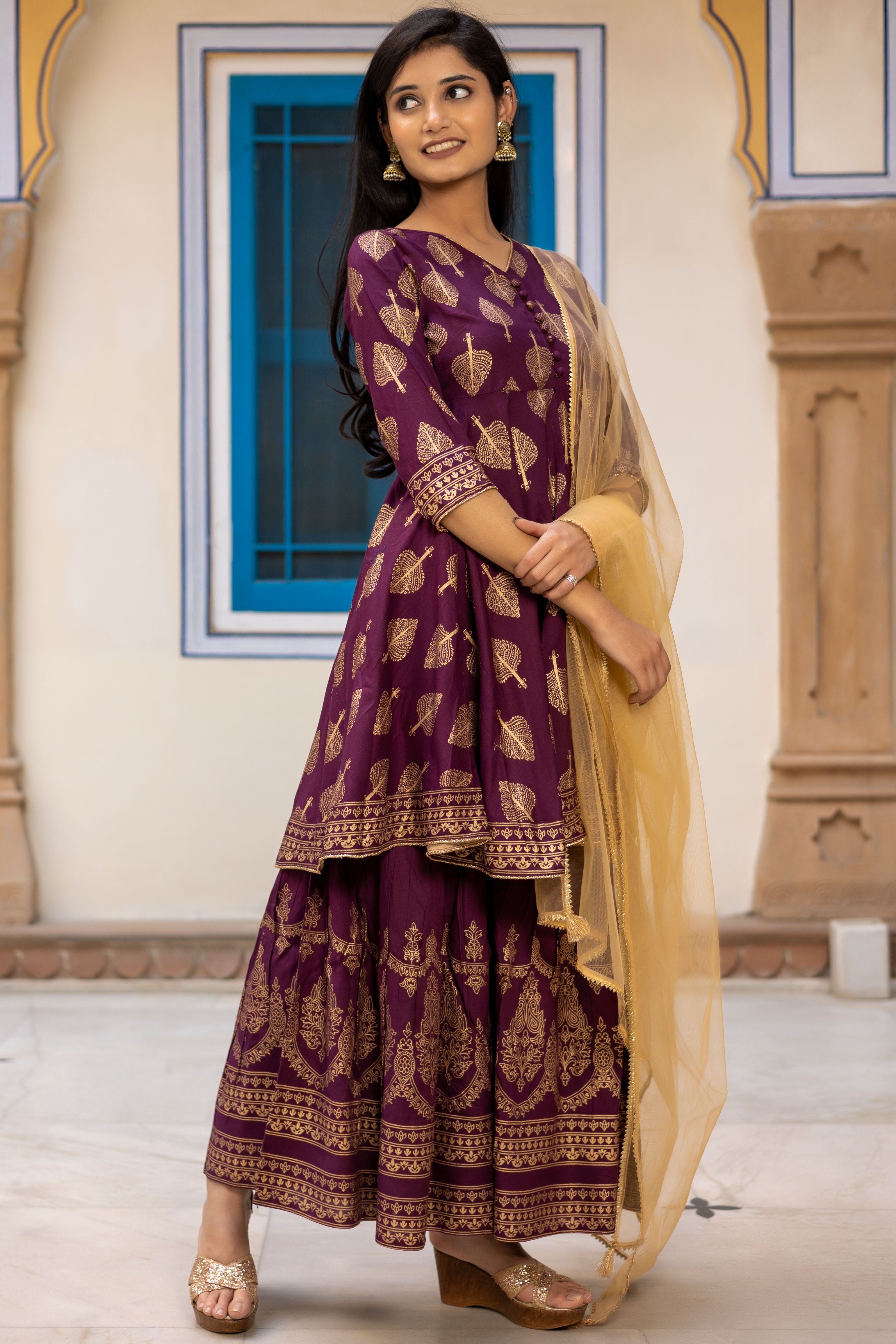 Maroon Gold Printed Flared Kurti with Mid Cut and Sharara Paired with Dupatta