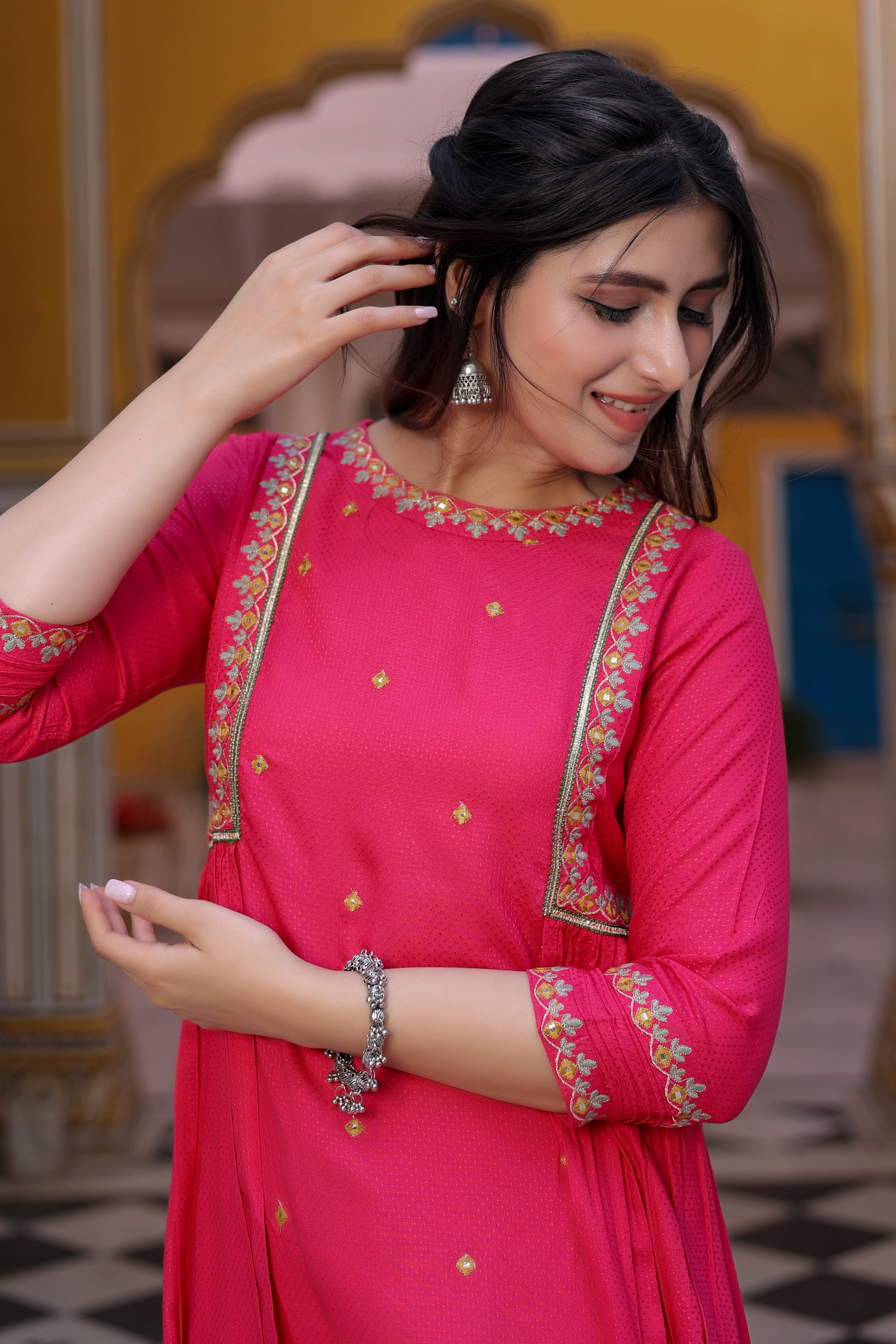 Pink Embroidered A-Line Kurta with Narrow Pant.