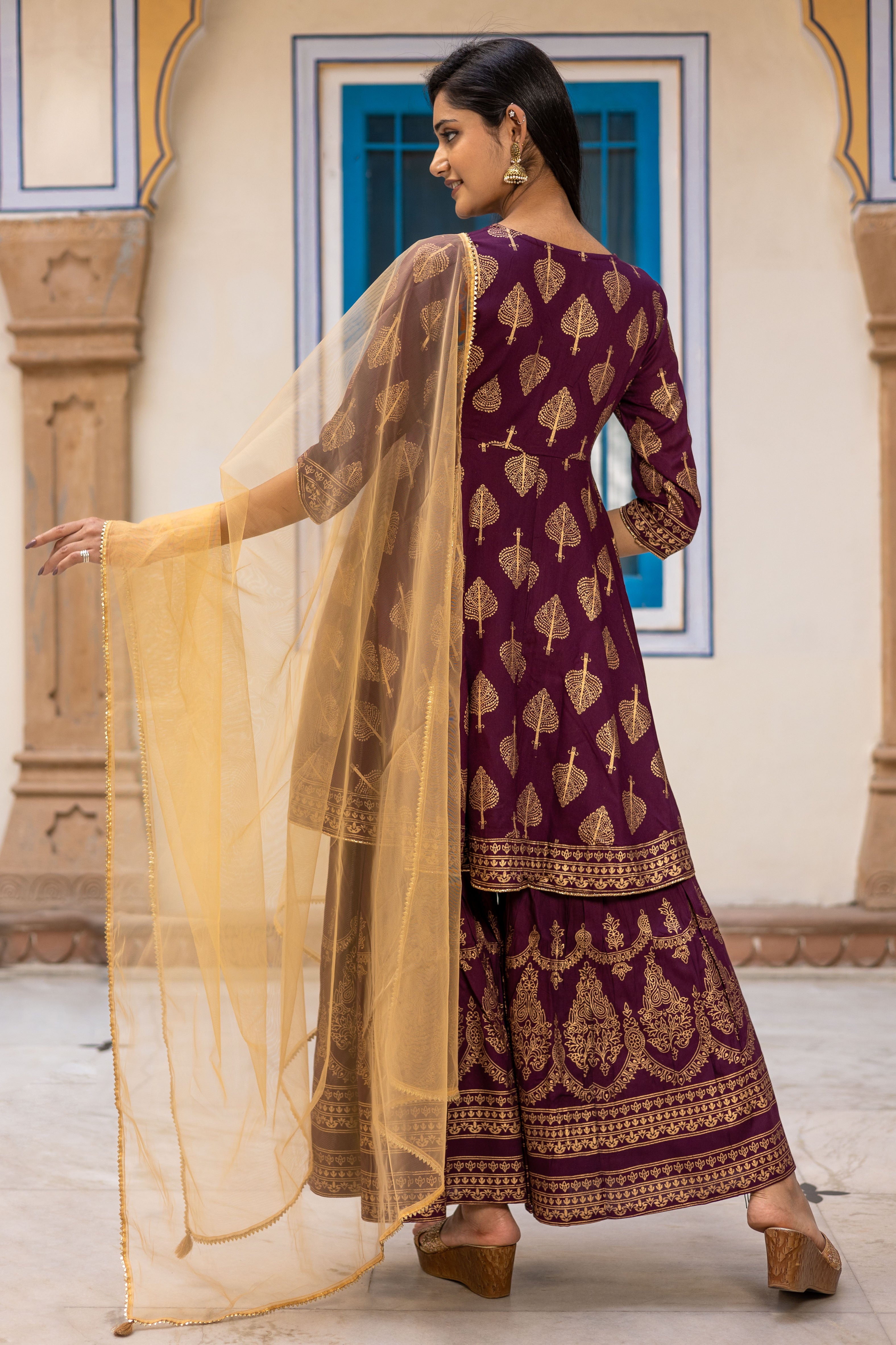 Maroon Gold Printed Flared Kurti with Mid Cut and Sharara Paired with Dupatta