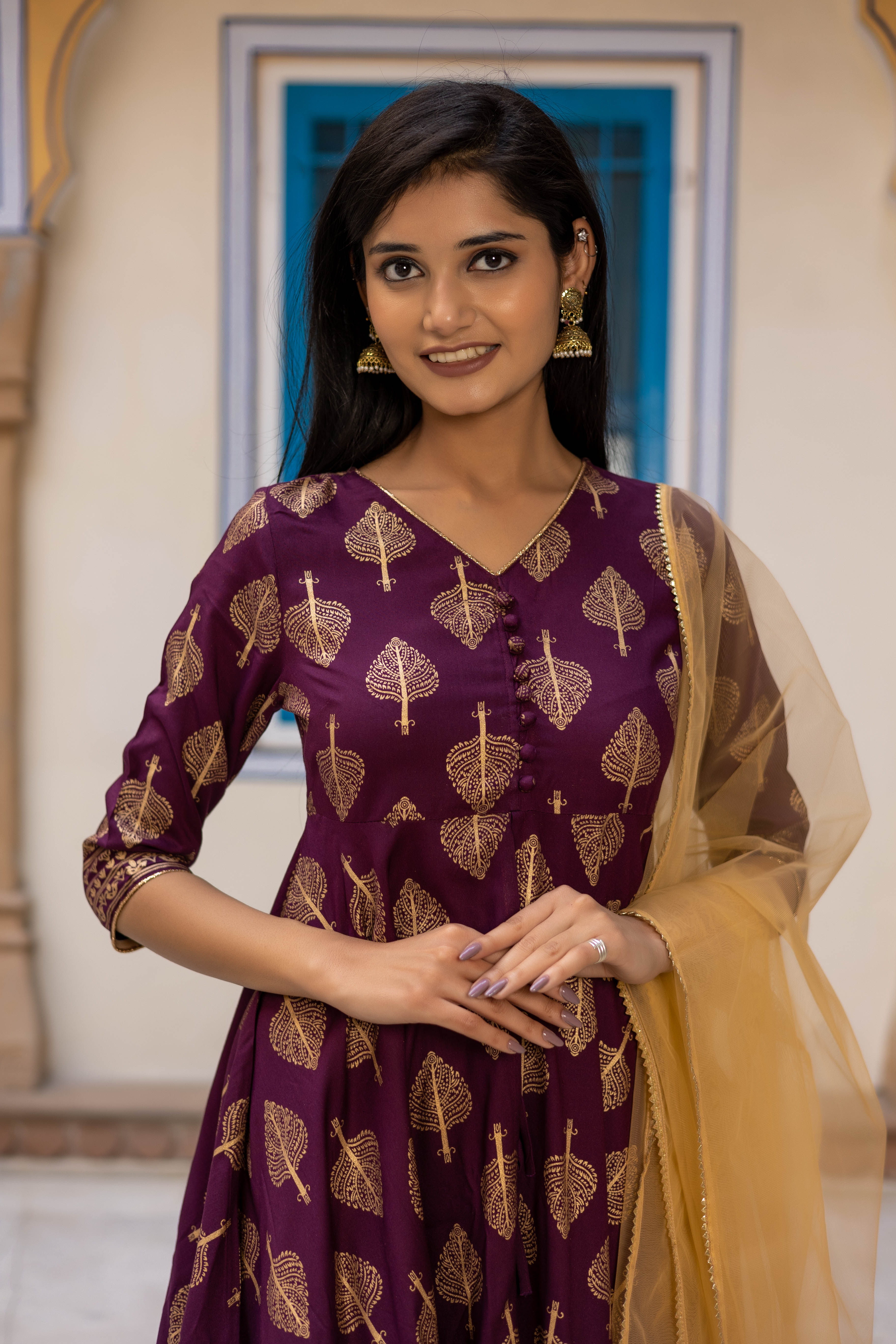 Maroon Gold Printed Flared Kurti with Mid Cut and Sharara Paired with Dupatta