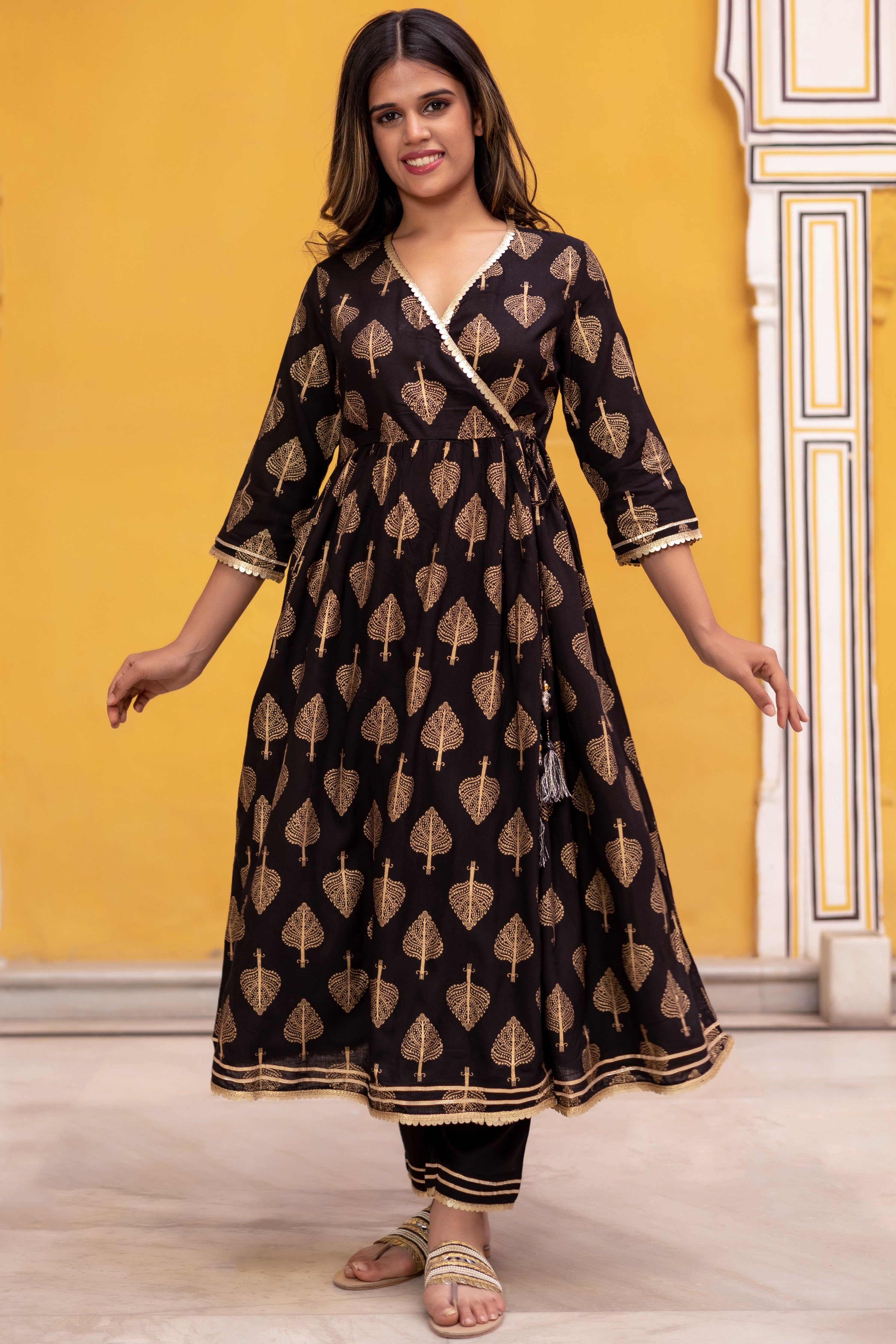 Black Gold Printed Angarkha Style Flared Kurti with Gathers and Narrow Pant.
