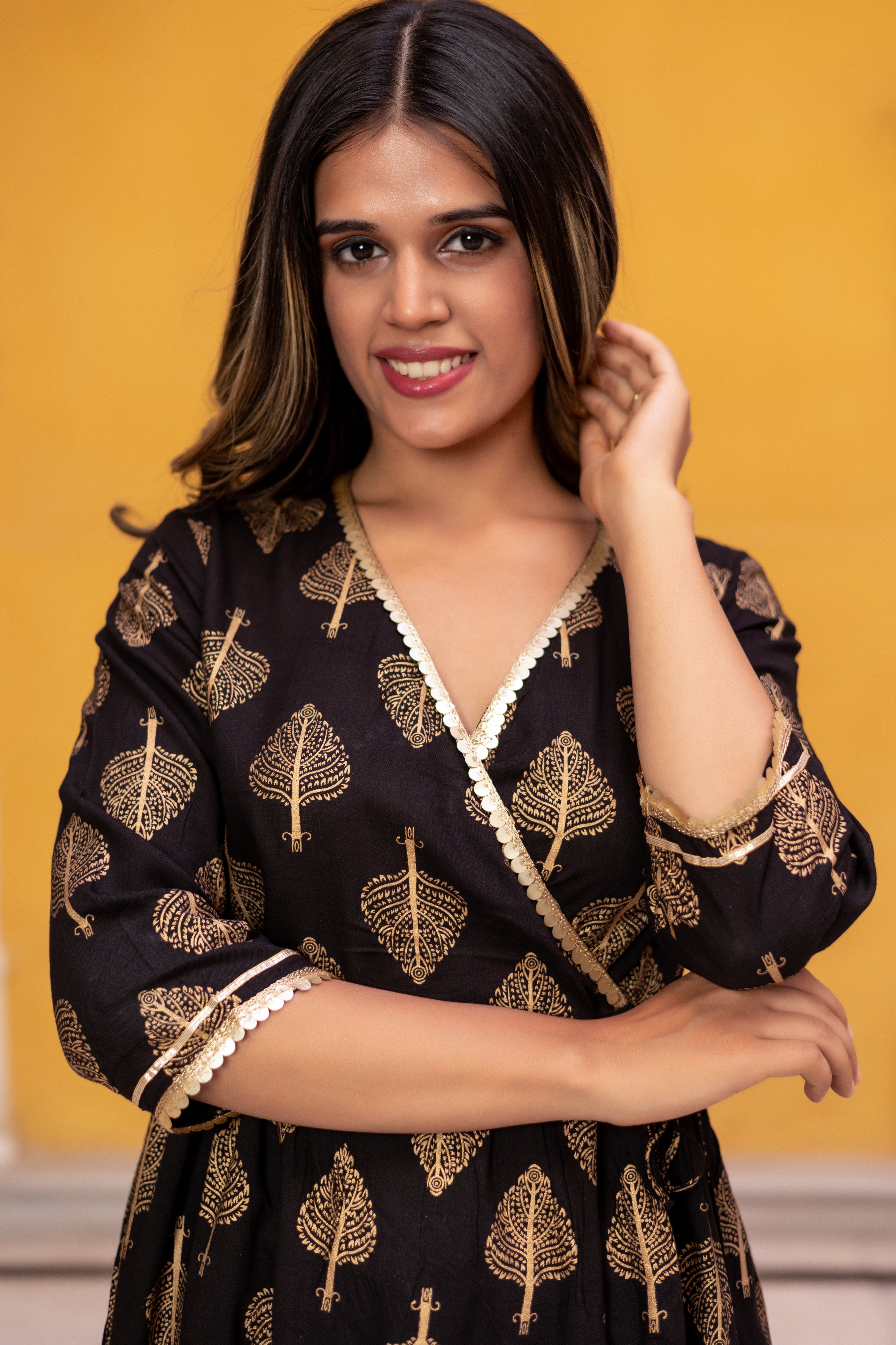 Black Gold Printed Angarkha Style Flared Kurti with Gathers and Narrow Pant.