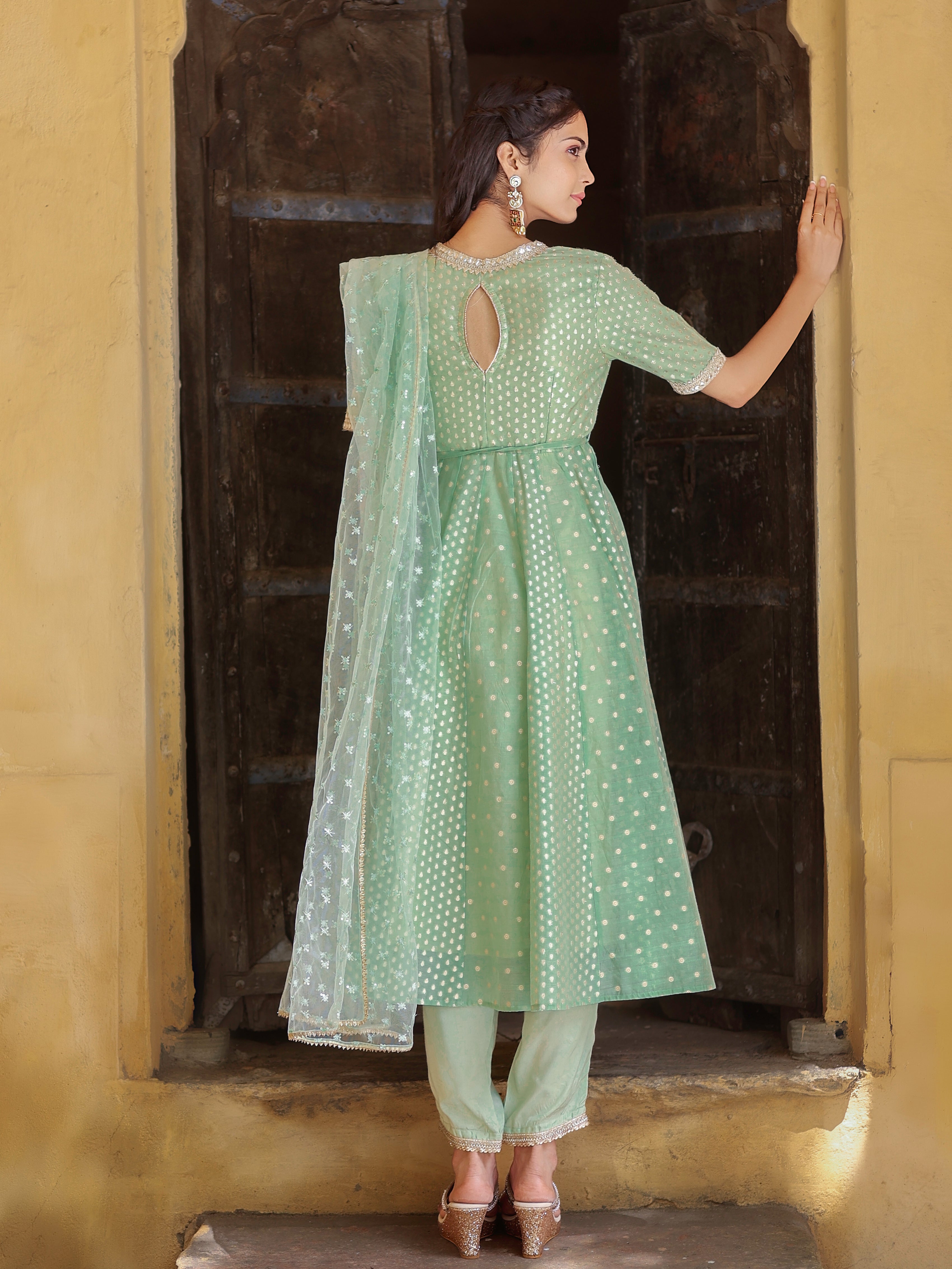Green Jacquard V neck Anarkali Kurti with Narrow Pant Paired with Dupatta