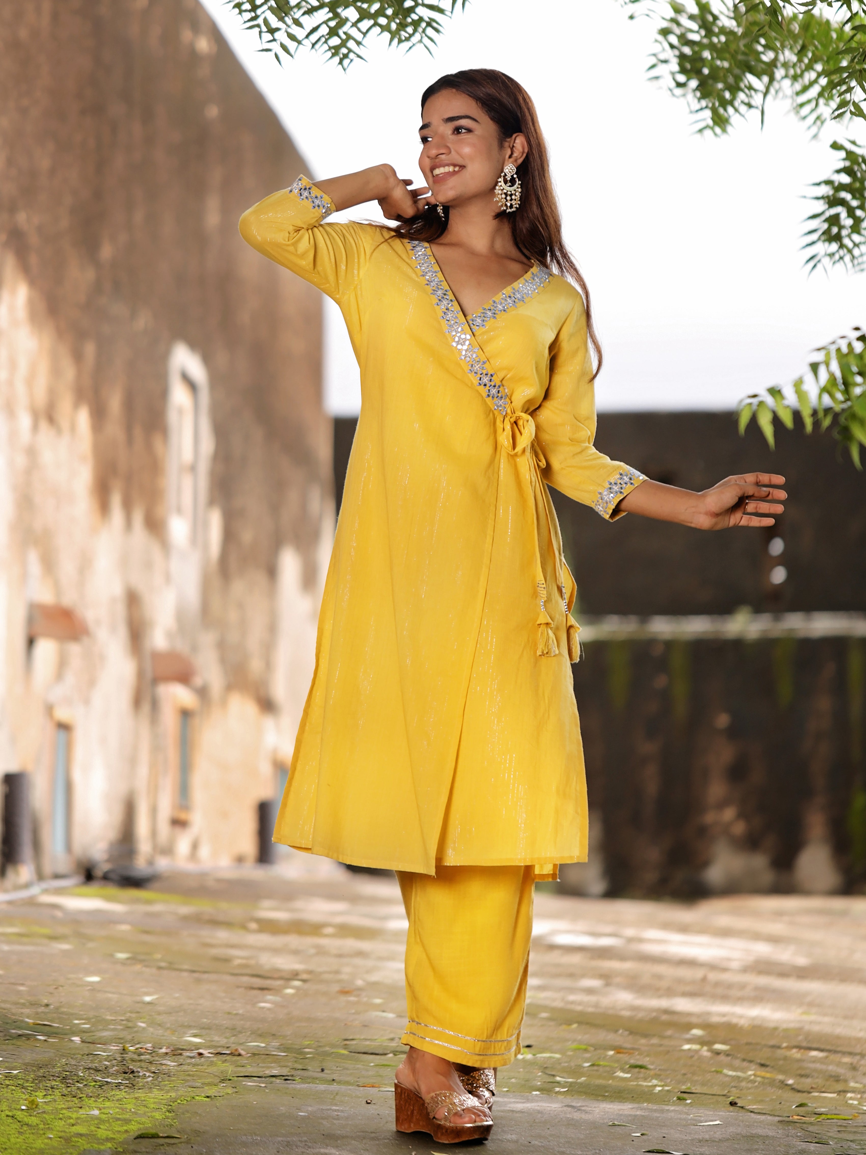yellow-embroidered-angarkha-style-straight-kurti-in-cambric-lurex-with-v-neck-and-embroiderd-quarter-sleeves-paired-with-straight-pant
