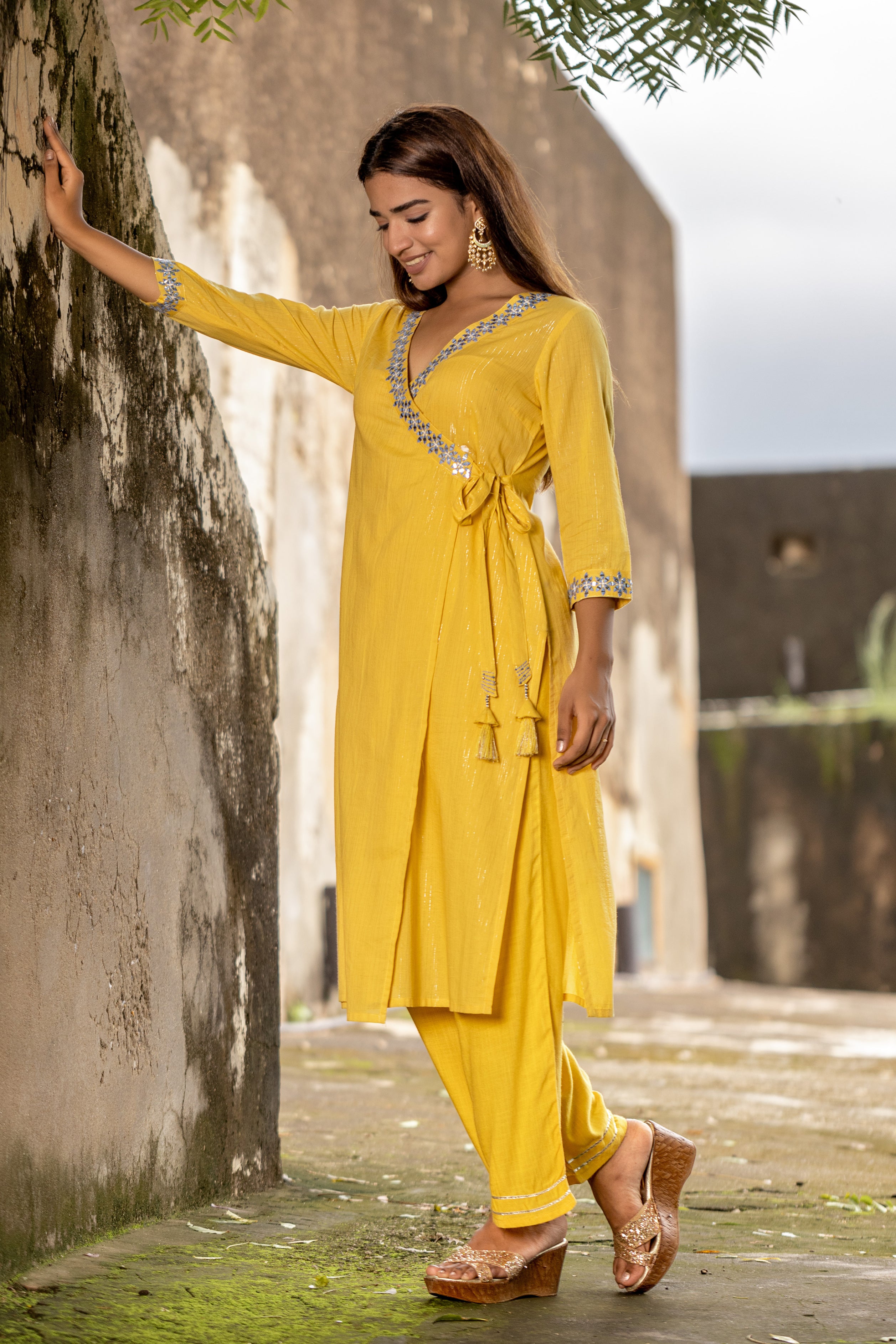 yellow-embroidered-angarkha-style-straight-kurti-in-cambric-lurex-with-v-neck-and-embroiderd-quarter-sleeves-paired-with-straight-pant