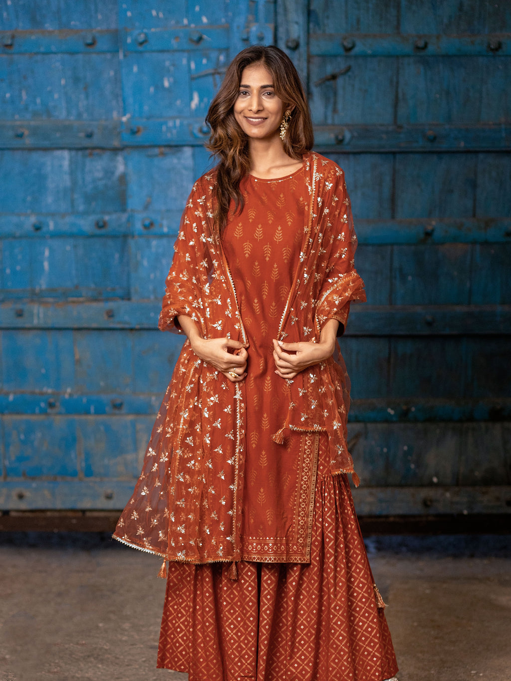 Rust Orange Gold Printed Straight Kurti with Side Tie-ups Paired with Sharara and Dupatta