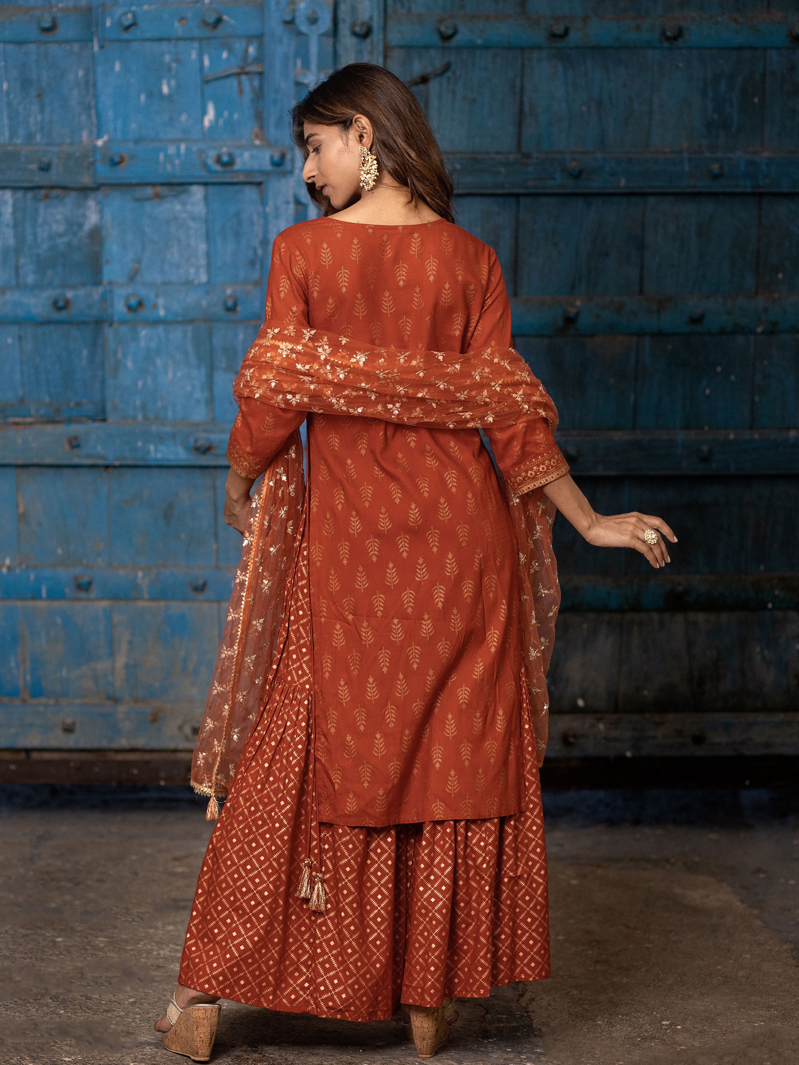 Rust Orange Gold Printed Straight Kurti with Side Tie-ups Paired with Sharara and Dupatta