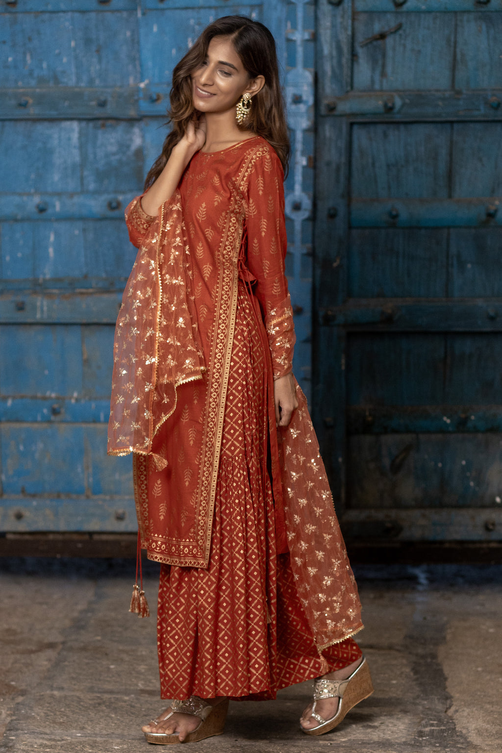 Rust Orange Gold Printed Straight Kurti with Side Tie-ups Paired with Sharara and Dupatta