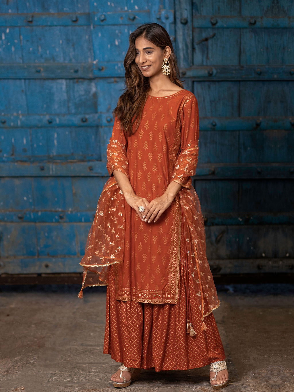 Rust Orange Gold Printed Straight Kurti with Side Tie-ups Paired with Sharara and Dupatta