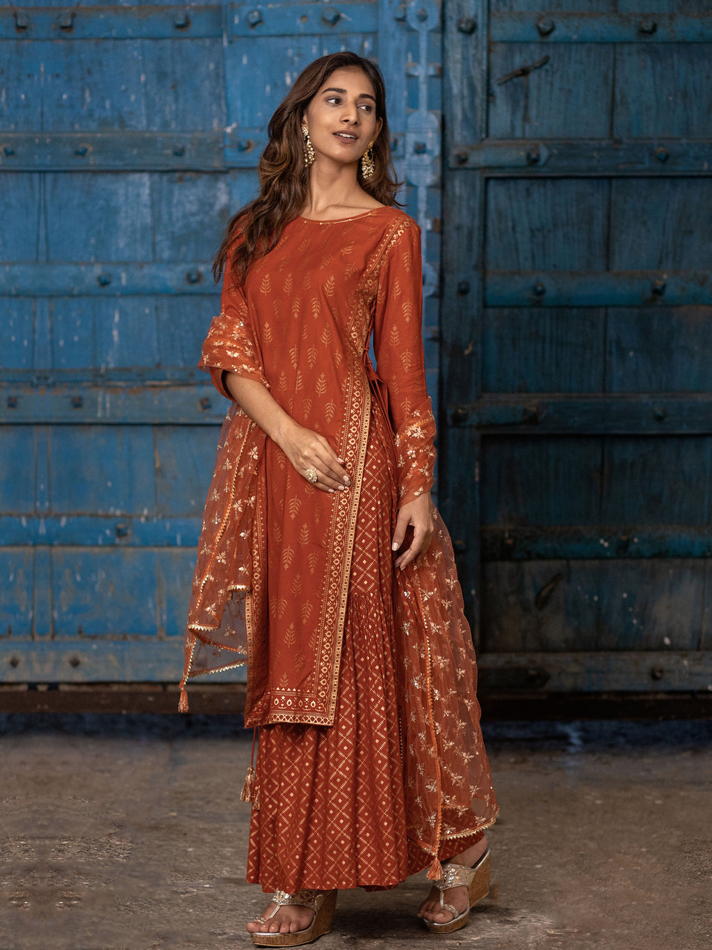 Rust Orange Gold Printed Straight Kurti with Side Tie-ups Paired with Sharara and Dupatta