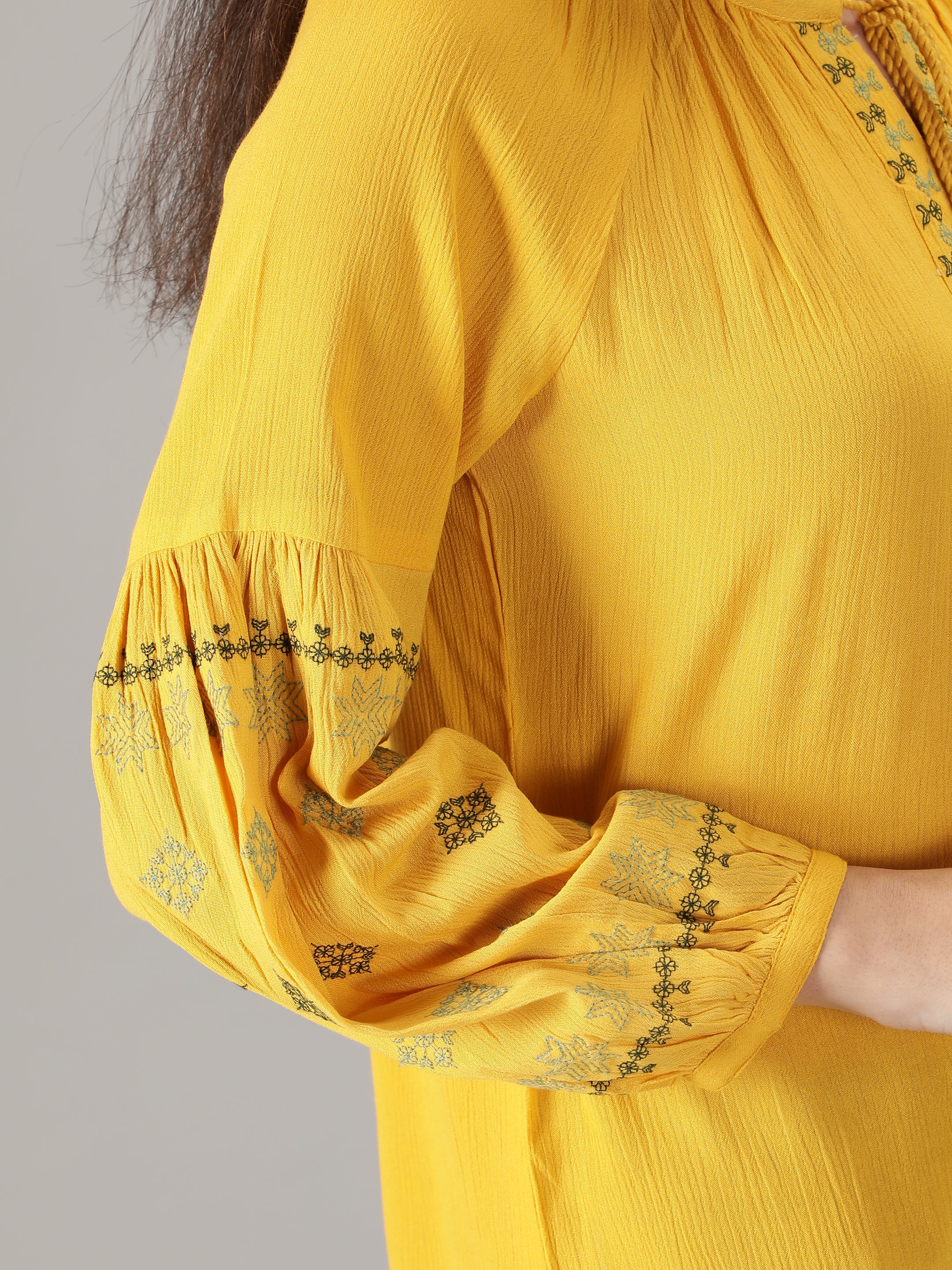 yellow-crepe-embroidered-top-with-tie-ups